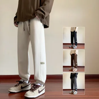 Новые модные мужские повседневные брюки в корейском стиле с эластичной резинкой на талии, популярные американские спортивные брюки с завязками на щиколотках, свободные повседневные брюки